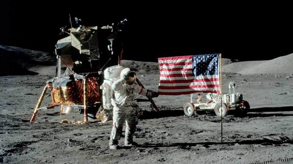 Apollo 17 astronaut Eugene Cernan salutes the American flag on the Moon, near the mission's Lunar Module