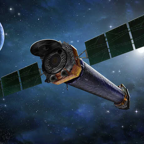 Artist concept of Chandra X-ray Observatory in space, backlit by the Sun with stars visible