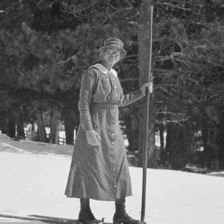 Black and white photo of Ynes Mexia on skis