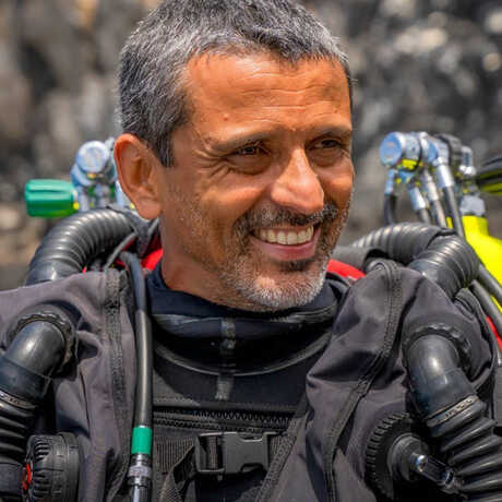 Luiz Rocha wearing rebreather dive gear and smiling