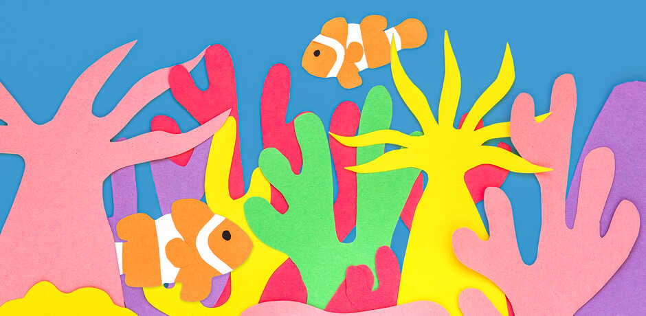 Construction paper coral reef scene with clownfish